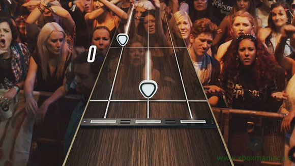 Guitar Hero Live 2015 para Xbox One se ve así, con el público delante y sus reacciones.